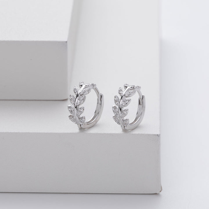 Silver earrings in the shape of a leaf