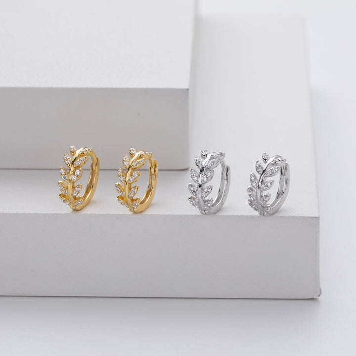 Silver earrings in the shape of a leaf