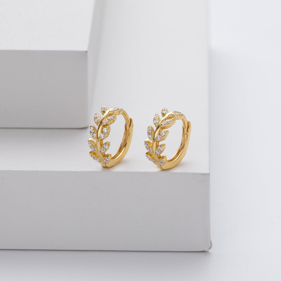 Silver earrings in the shape of a leaf