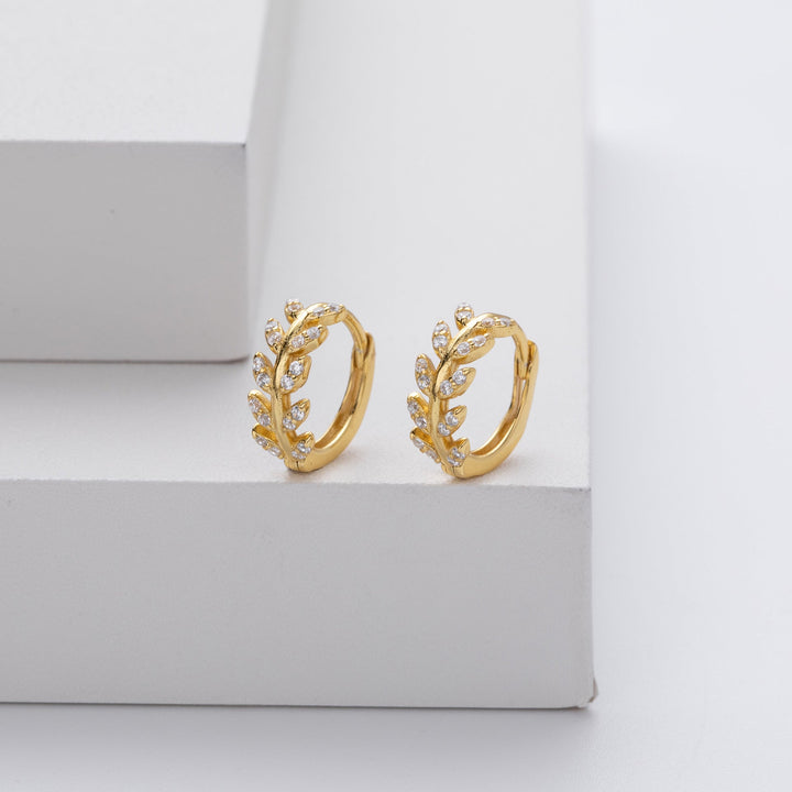 Silver earrings in the shape of a leaf
